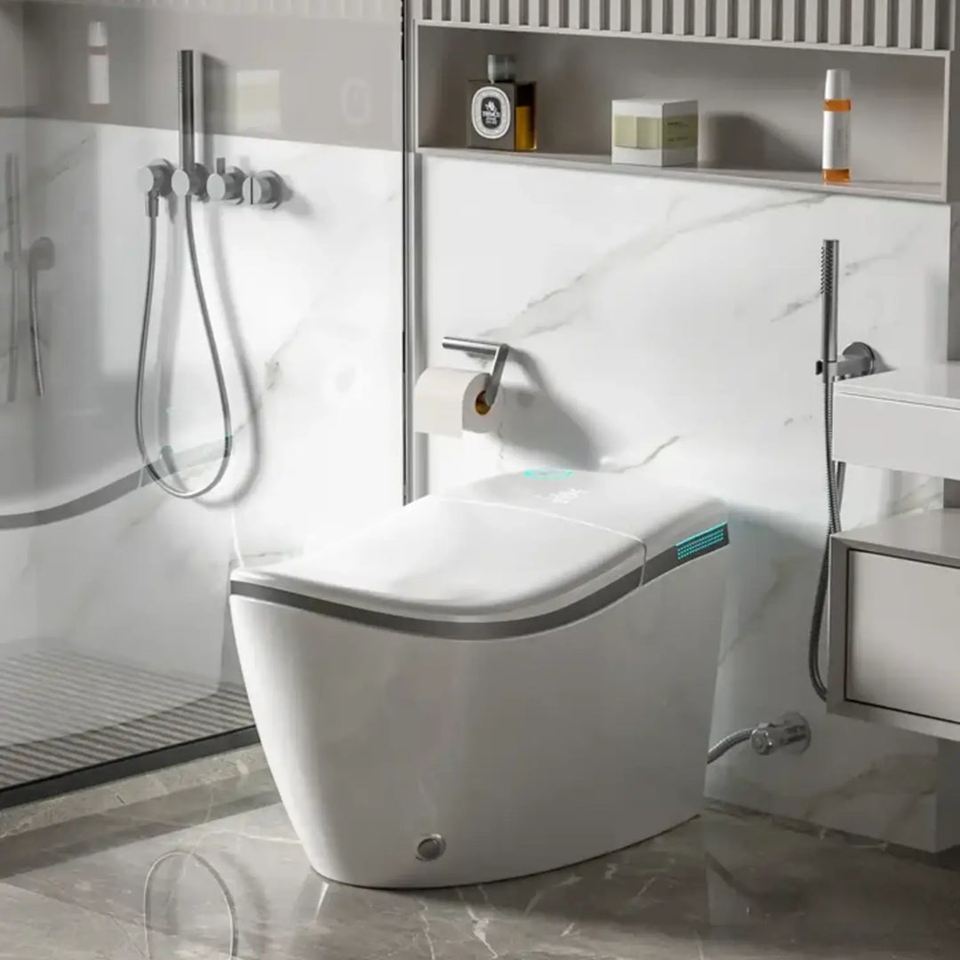 Hands‑Free Smart Toilet with Heated Seat, UV Sterilization, Aromatherapy, and ToeTouch Control