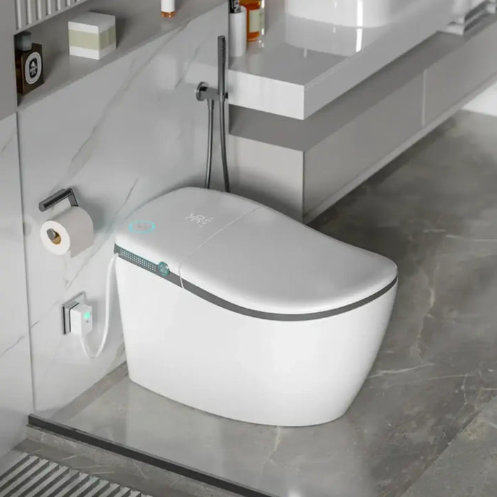 Hands‑Free Smart Toilet with Heated Seat, UV Sterilization, Aromatherapy, and ToeTouch Control