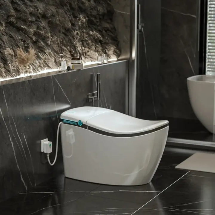Hands‑Free Smart Toilet with Heated Seat, UV Sterilization, Aromatherapy, and ToeTouch Control